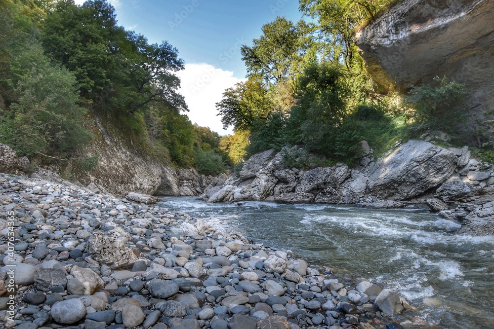 Stormy water flow of the mountain Adyghe river