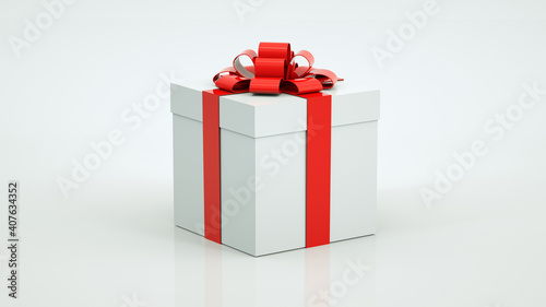 White gift box with a red ribbon bow isolated on a white background.