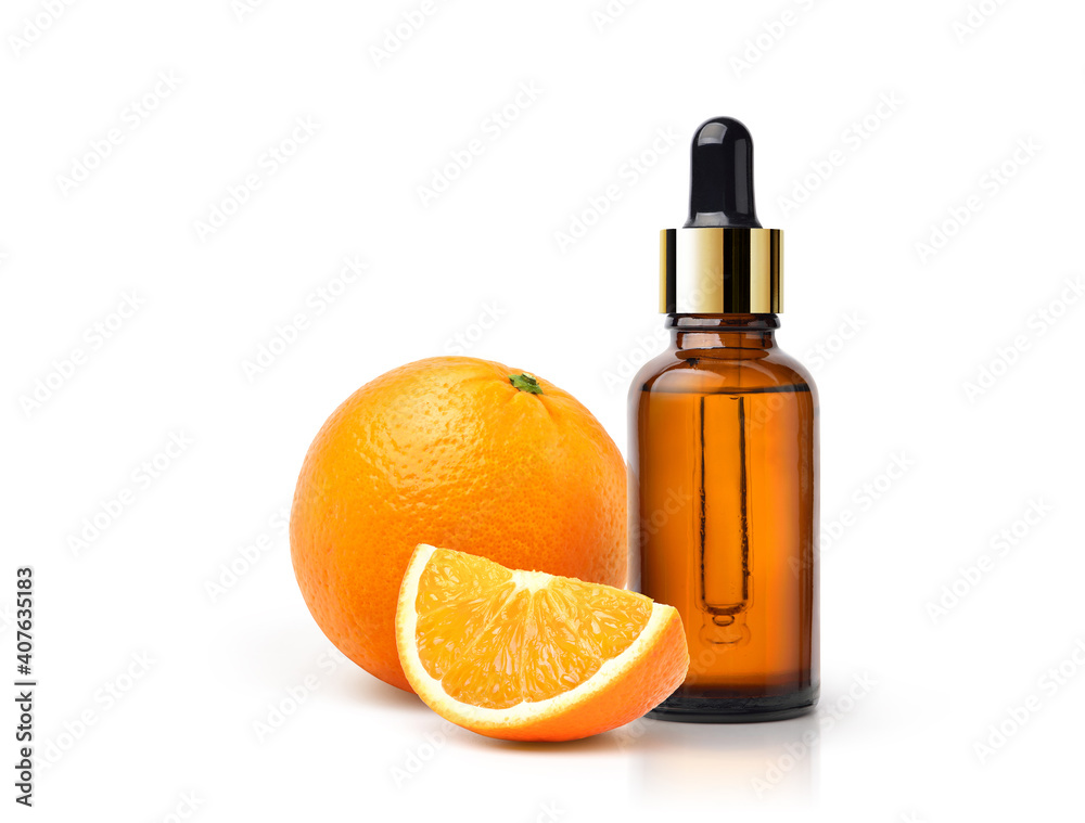 Orange essential oil with orange fruit  and sliced isolated on white background.