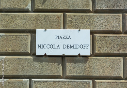 Piazza Niccola Demidoff street sign on the wall in Florence, Italy photo