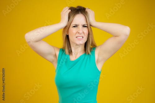 Young caucasian woman over isolated background doing nervous gesture