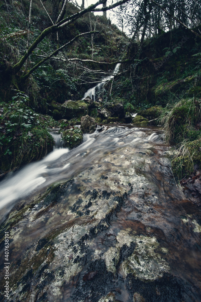Cold river in the mountains in winter Cold river in the mountains in winter