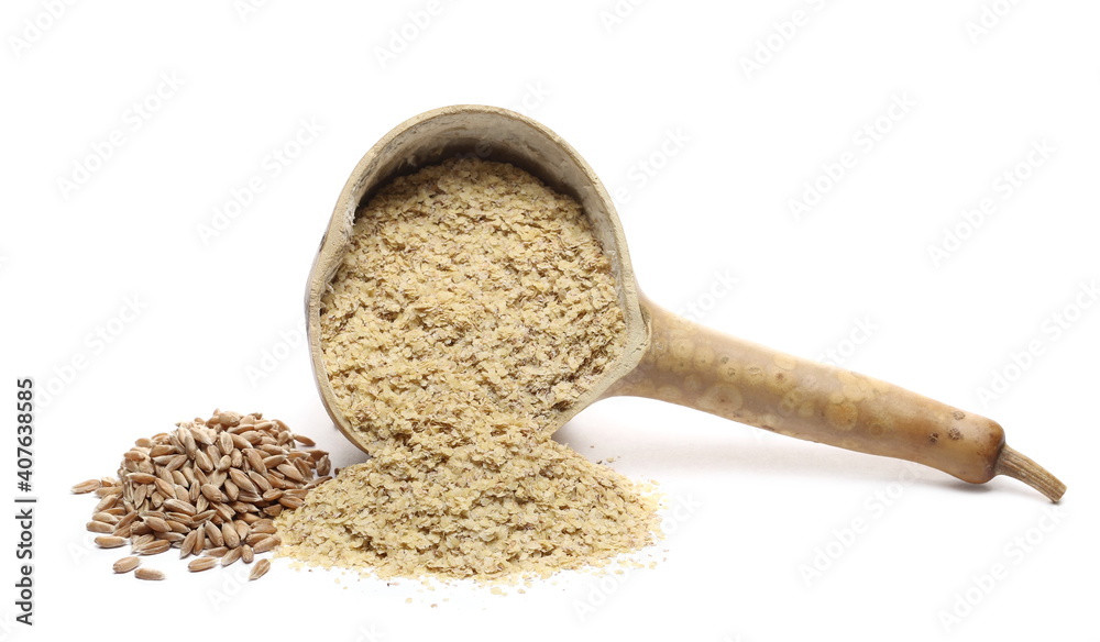 Wheat germ and spelt seed pile with gourd spoon, calabash half isolated on white background Wheat germ and spelt seed pile with gourd spoon, calabash half isolated on white background