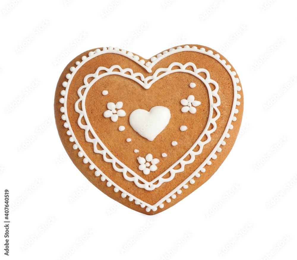 Obraz premium Gingerbread heart decorated with icing isolated on white
