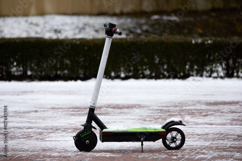 electric scooter in a park on a winter day