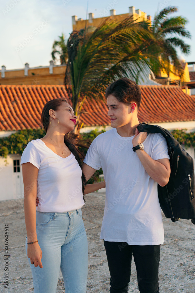 Romantic couple walking down the street Romantic couple walking down the street