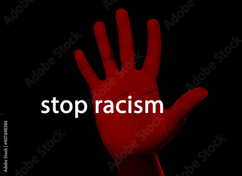 Fotografie Stop Racism. Man showing hand on black background, closeup