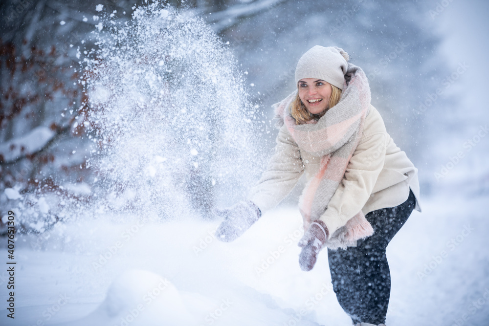 Happy girl playing with snow outdoor Happy girl playing with snow outdoor