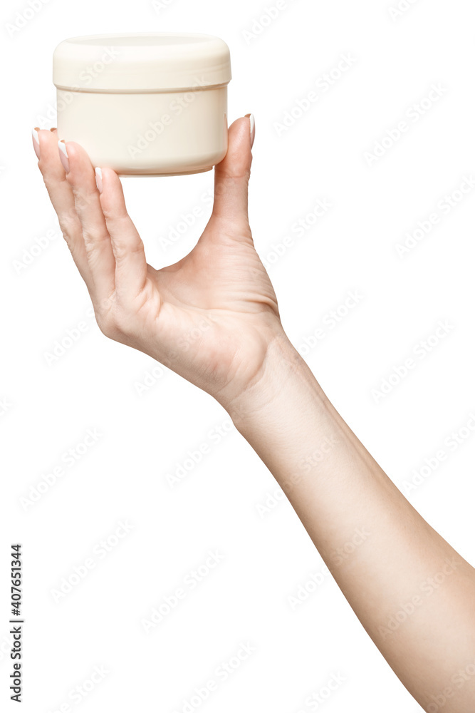 hand holding plastic can of cream Isolated on a white background hand holding plastic can of cream Isolated on a white background