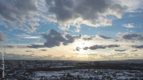 Beautiful timelapse, clouds over the city of ivano-frankivsk in winter in the afternoon. High quality 4k footageс photo