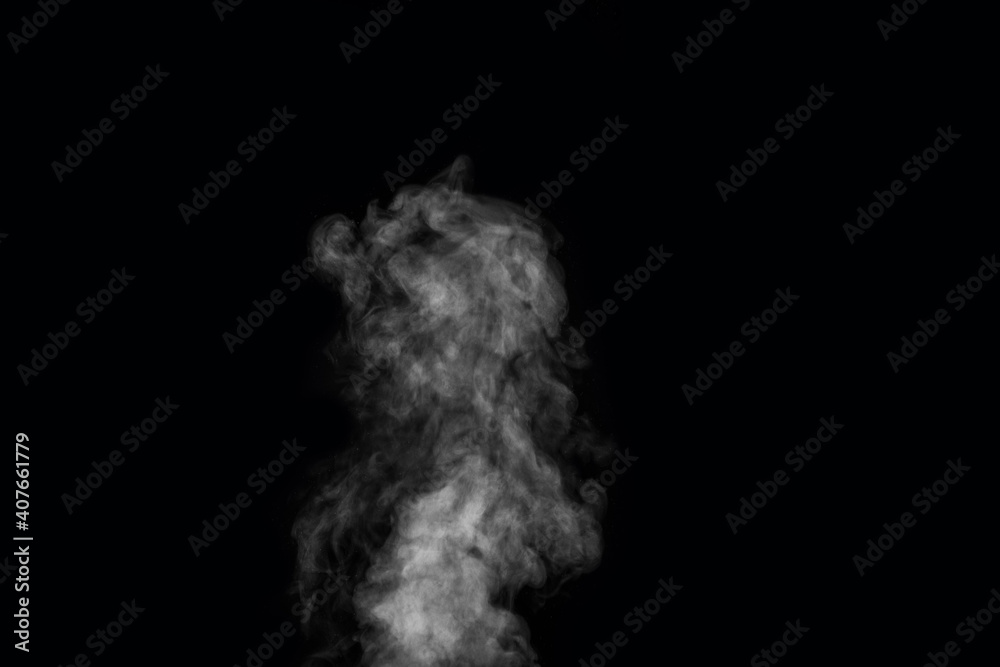 Figured smoke on a dark background. Abstract background, design element, for overlay on pictures.