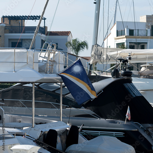 Flag of the Marshall Islands on sea boat photo