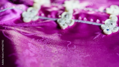 qi pao traditional Chinese  knot buttons on silk dress with beautiful patterns