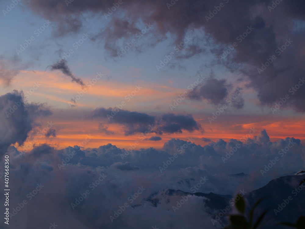 sunset over the mountains with afterglow