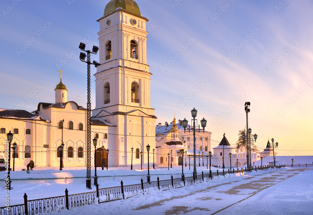 Tobolsk Kremlin on a winter evening. The bell tower of the St. Sophia Assumption Cathedral in the evening light. Old Russian architecture of the XVII century in the first capital of Siberia