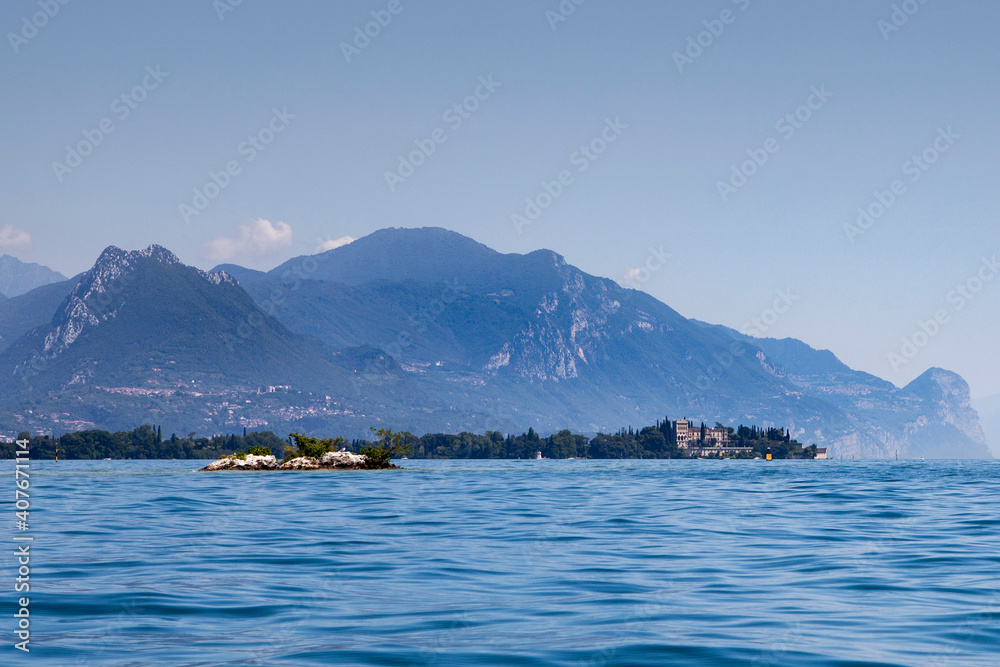Panoramic view of the southern part of Lake Garda with Island Garda. Region of Sirmione in Italy..