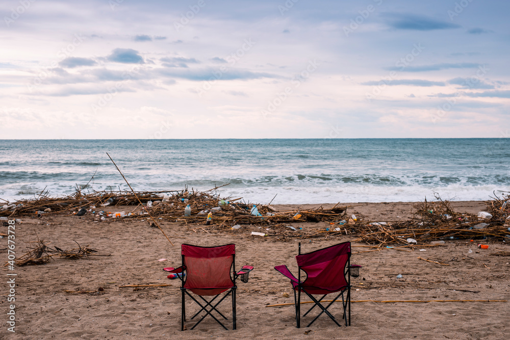 Waves pushing plastic waste to the beach