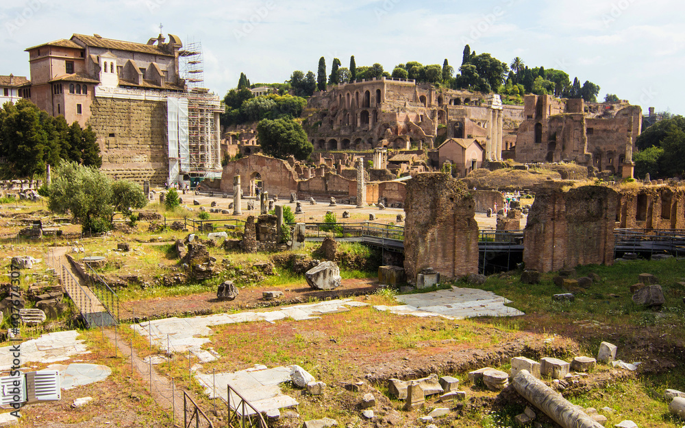 Aerial view of Roman Forum or Forum Romanum (Temple of Saturn and Arch of Septimus and other buildings) in Rome, Italy. View on the ancient ruins from the Capitoline Hill