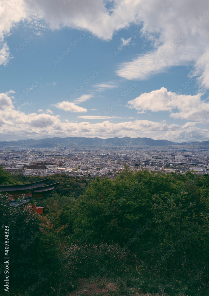 Fototapeta premium View from a mountain down on Kyoto, Japan.