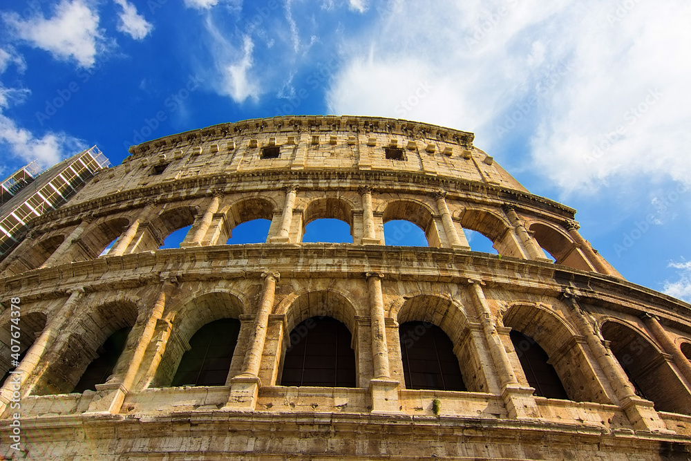 The ancient Roman Colosseum also known as the Flavian Amphitheatre in Rome, Italy.  It is large amphitheatre  and one of the top tourist attractions in Europe 