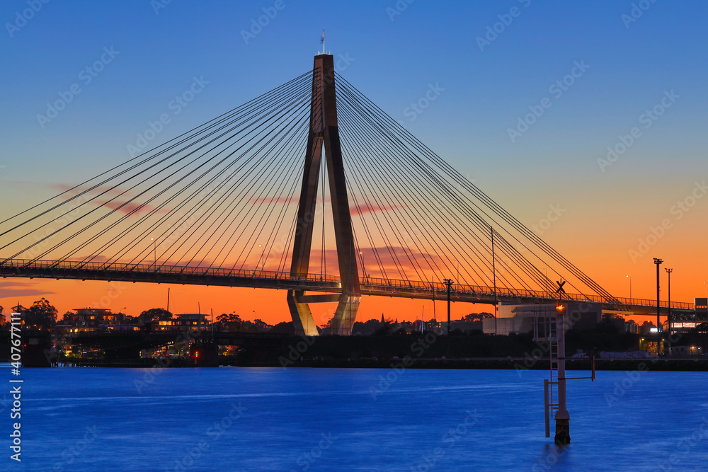 Anzac Bridge at Sunset orange and blue skies Sydney NSW Australia