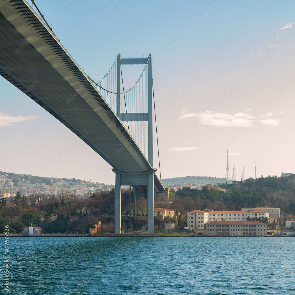 Fototapeta premium Tower of Bosporus suspension bridge, Ortakoy district, Istanbul Turkey