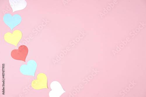 Heart shaped paper sticked on pink background. Emblem of love for happy women, beloved mother, birthday cards and valentine greeting designs. Valentine's day backgrounds. Templates to convey our love. © AndhikaRaya