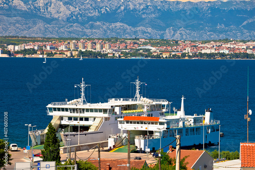 Island of Ugljan ferry port and Zadar view with Velebit mountain background
