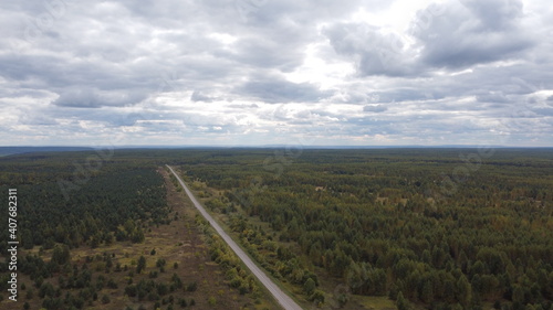 road and forest view from the copter