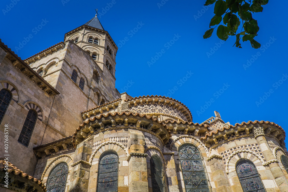 view of the Notre Dame du Port basilica, a romanesque church in Clermont-Ferrand, Auvergne (France)