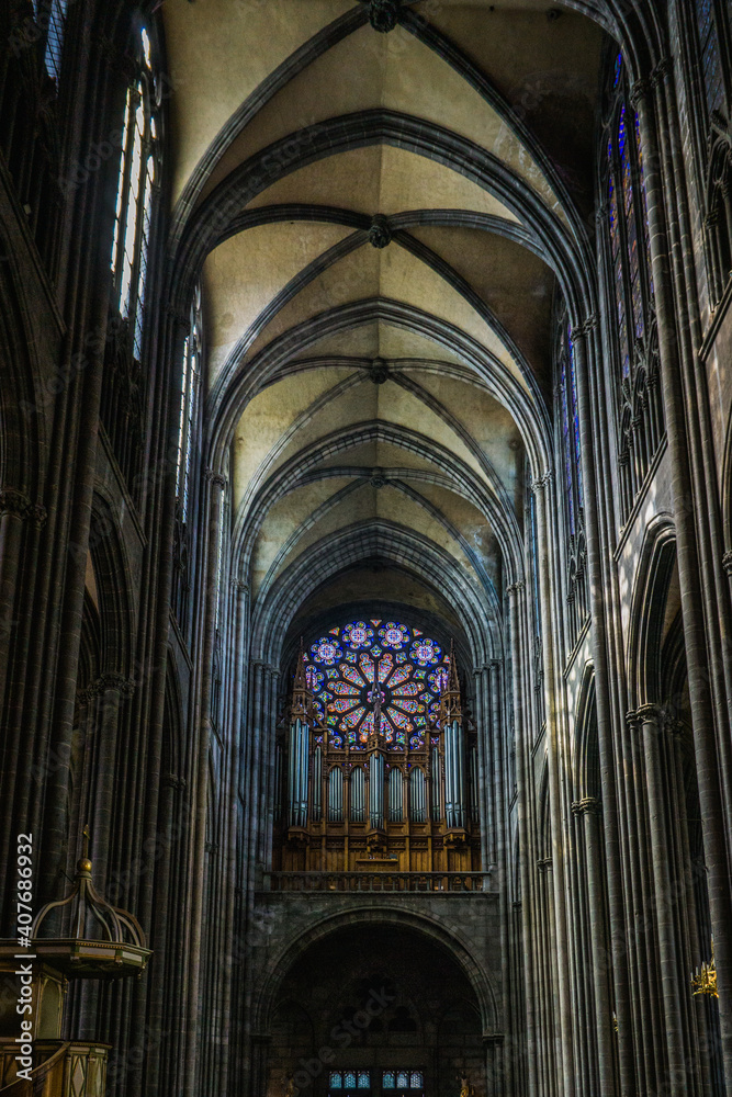 Clermont-Ferrand, France - September 17th, 2019: Inside Notre de L'Assomption Cathedral, a majectic 13th century gothic cathedral built in volcanic stone in the historic center of Clermont Ferrand.