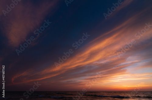 Colorful Sunset sky over the sea © Алексей Голубев