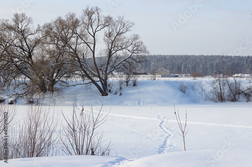 View of the snowy river and nature. Winter countryside landscape 