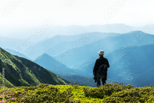 Man silhouette on foggy mountains. Travel concept. Landscape photography