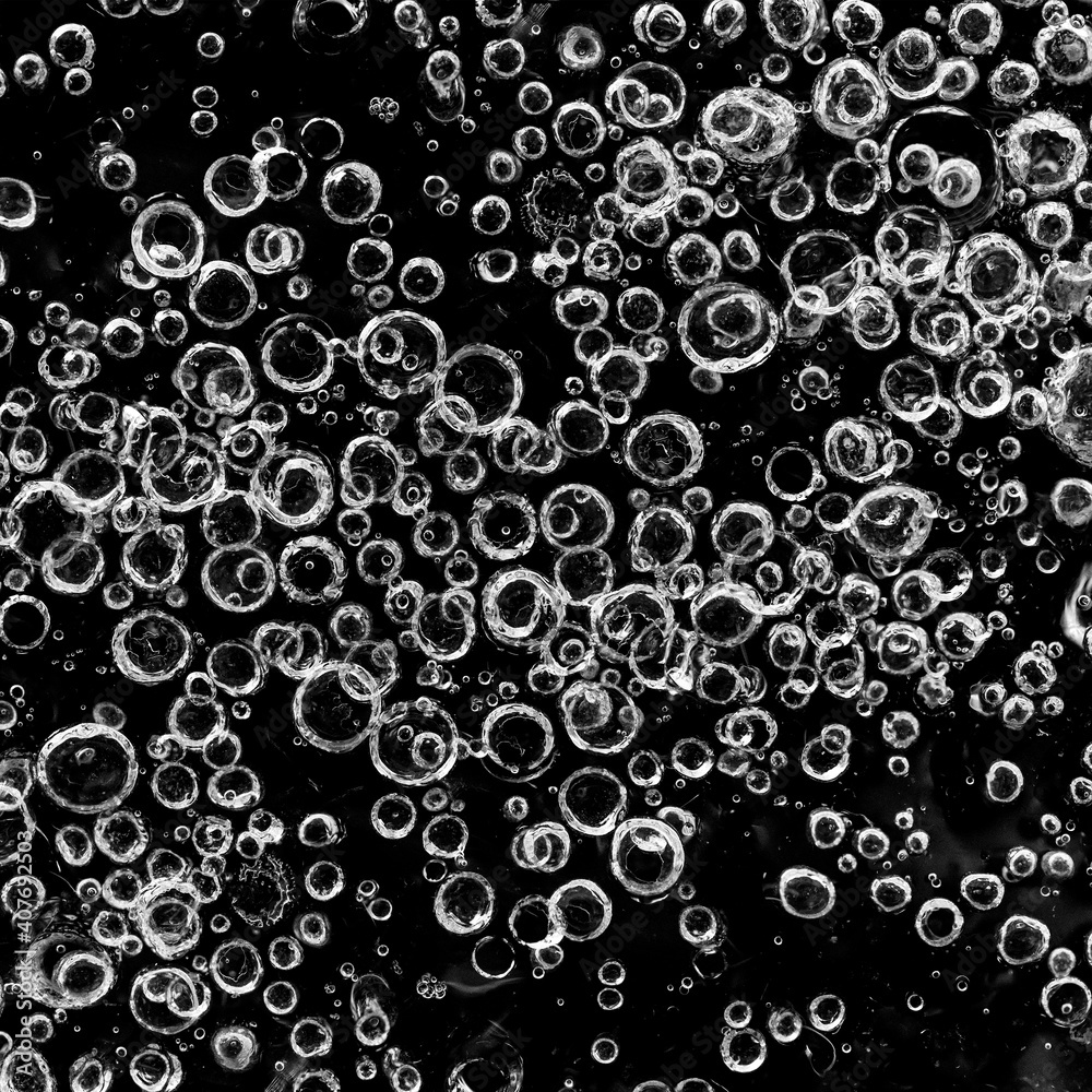 Beautiful Close-up on air bubbles stuck in frozen water