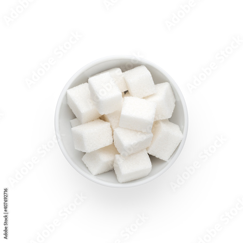 white bowl of sugar cubes