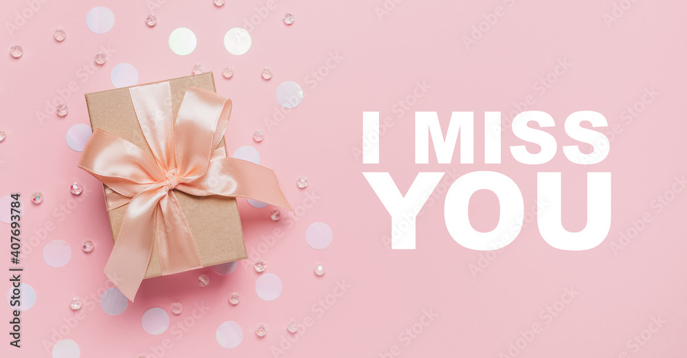 Gifts on pink background, love and valentine concept with text I miss you