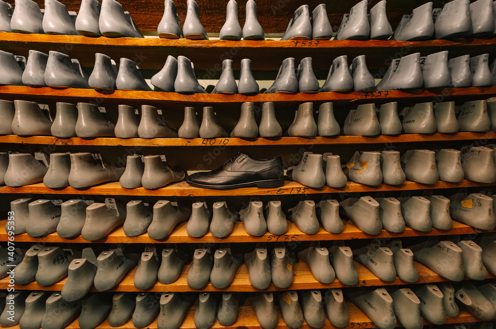 Blanks or pads for shoes are on the shelves in the cabinet in the shoe plant.