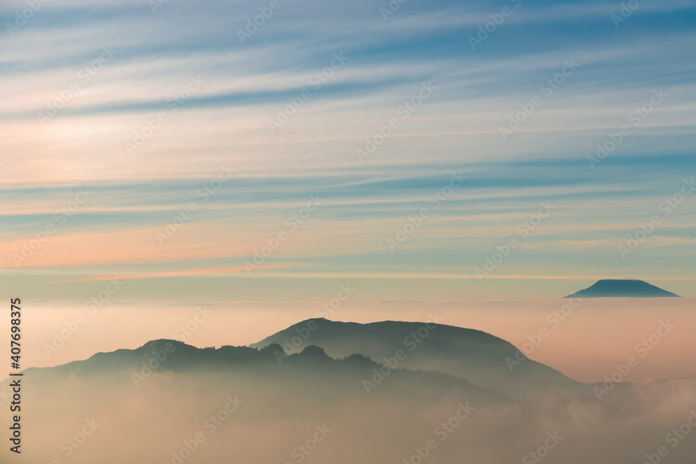 view of the sindoro mountains with a sea of ​​clouds
