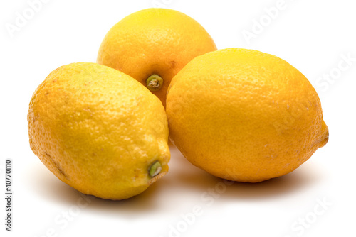Thee lemons on white background