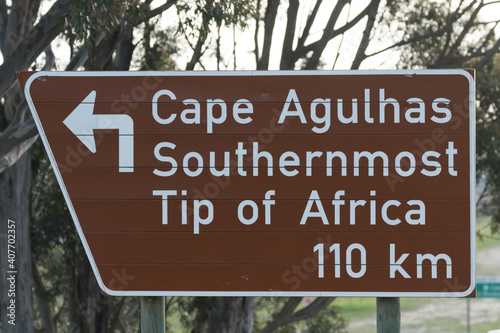 Cape Agulhas southernmost tip of Africa road sign showing direction and distance © Childa