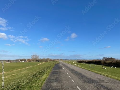 Road on a dyke around Laaksum in Friesland