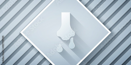 Paper cut Runny nose icon isolated on grey background. Rhinitis symptoms, treatment. Nose and sneezing. Nasal diseases. Paper art style. Vector.