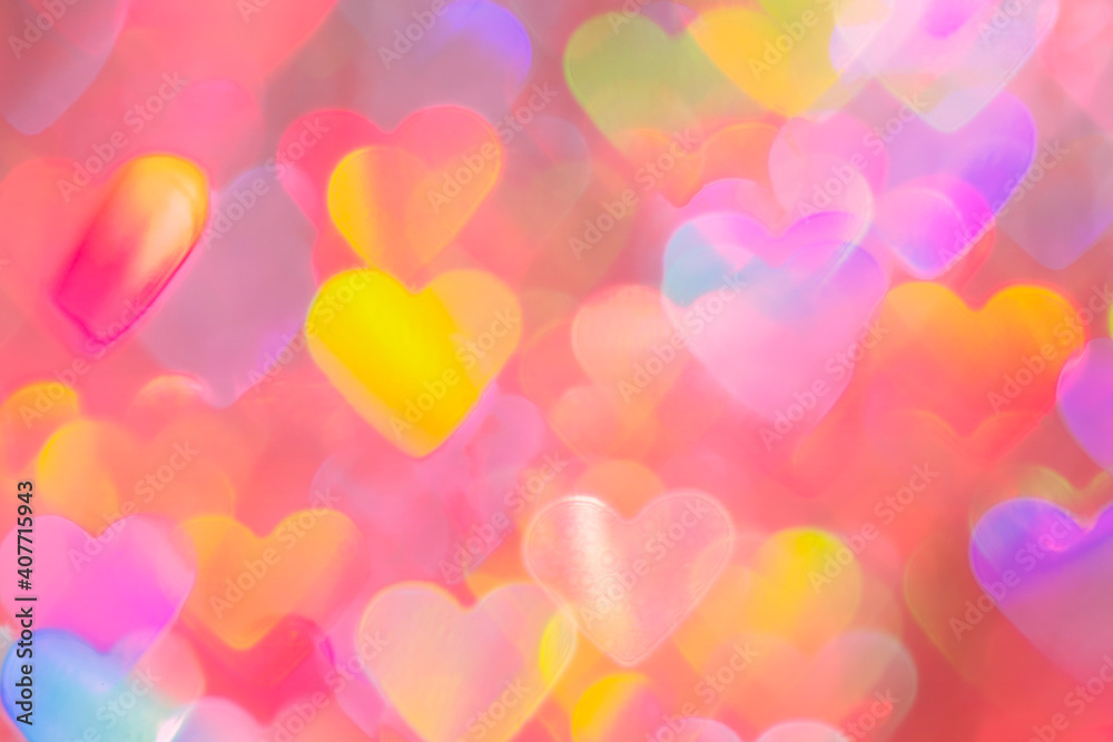 blurred heart shaped holographic bokeh lights background