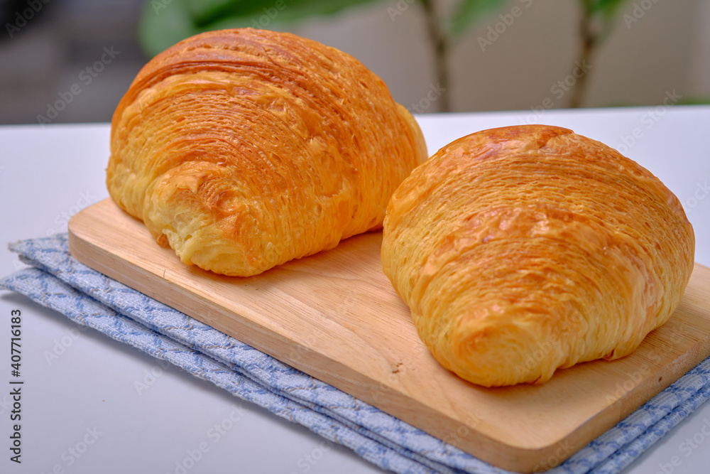 Warm Fresh Buttery Croissants and Rolls. French and American Croissants and Baked Pastries are enjoyed.