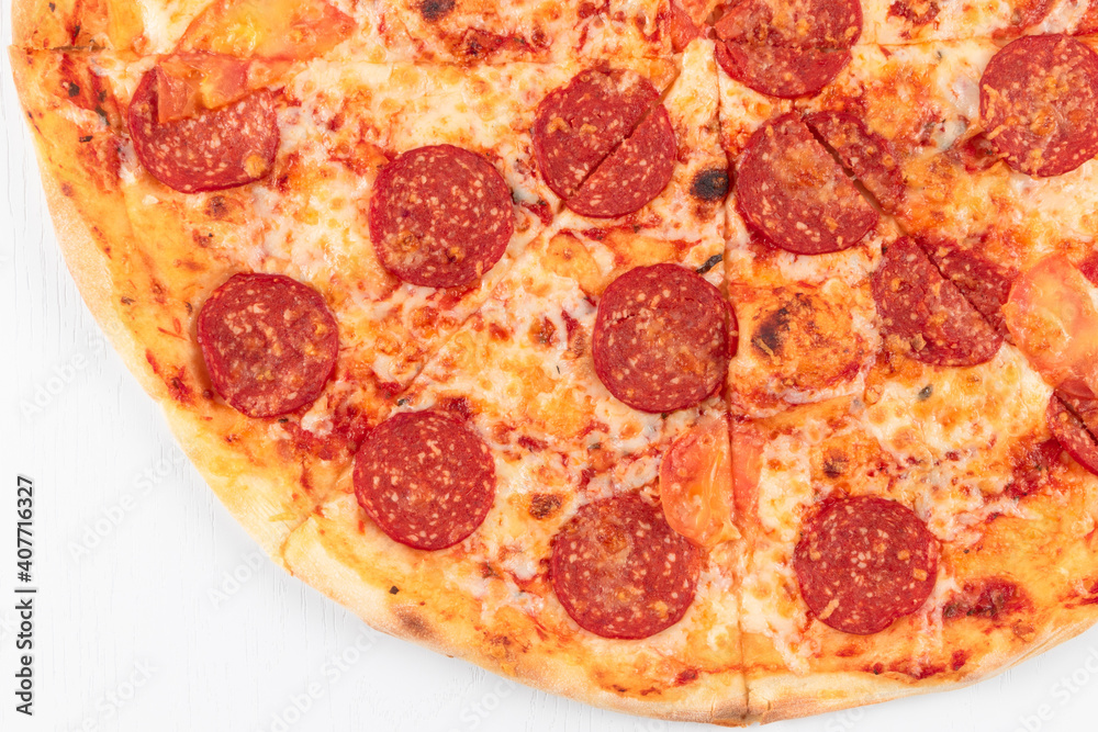 fresh aromatic hot italian pepperoni pizza with mozzarella cheese on white wooden table background fresh aromatic hot italian pepperoni pizza with mozzarella cheese on white wooden table background