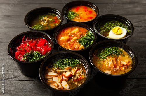 Business lunch in eco plastic container ready for delivery.Top view. Office Lunch boxes with food ready to go. Food takes away. Catering, brakfast