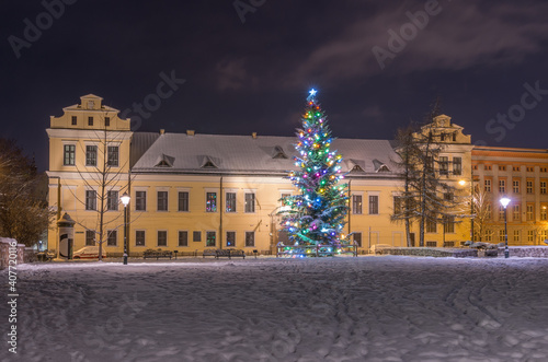 Winter in Krakow, Christmas Tree and Bishop's Palace in the snow, night, Poland