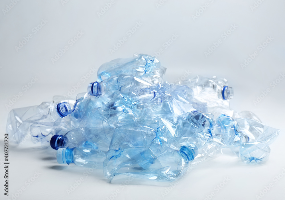 Heap of used plastic bottles on white background. Recycling problem Heap of used plastic bottles on white background. Recycling problem