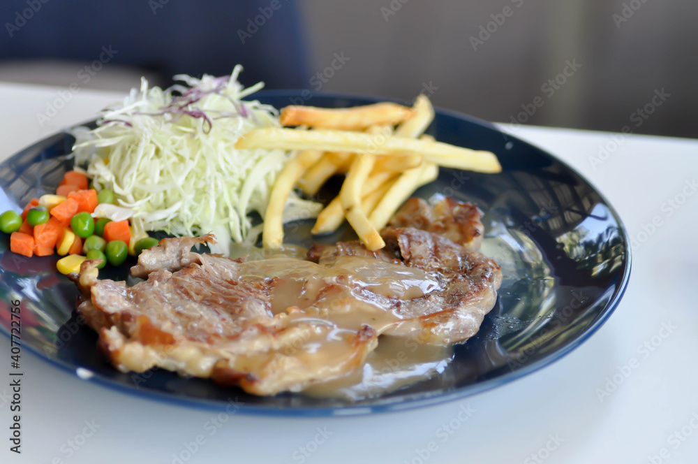 pork steak with French fries pork steak with French fries